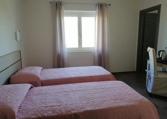 Maison Kaina Όλμπια